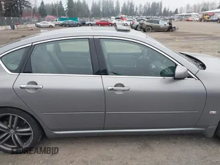 2007 Infiniti M Sport z VIN JNKAY01EX7M302565, wystawiony jako IAAI lot #41885272 z przebiegiem 151 745 mil mil oraz . Historia ofert i sprzedaży dostępna na DreamBid. Obrazek 13.
