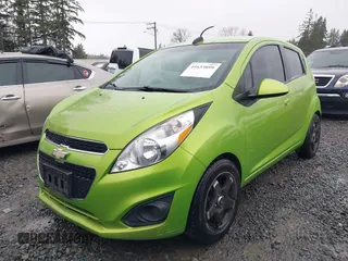 2015 Chevrolet Spark LS with VIN KL8CB6S98FC728462, listed as a IAAI auction lot 41653899 with 105,432 mi miles and . Bid and sale history available at DreamBid. Image 2.