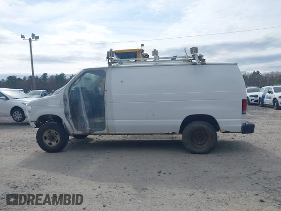 2011 Ford Econoline Cargo Commercial with VIN 1FTNE2EL0BDB36890, listed as a IAAI auction lot 42049933 with Not Provided miles. Bid and sale history available at carsss.com. Image 13.