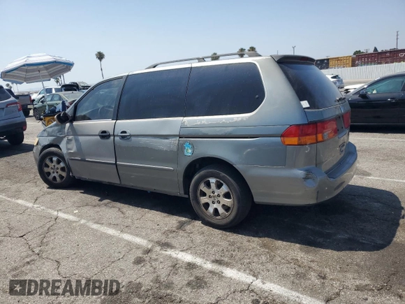 2002 Honda Odyssey EX-L with VIN 2HKRL189X2H530814, listed as a Copart auction lot 62280465 with 270,080 mi miles and Salvage title. Bid and sale history available at DreamBid. Image 2.