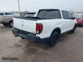 2023 Honda Ridgeline Black Edition with VIN 5FPYK3F82PB020278, listed as a IAAI auction lot 41462889 with 12,100 mi miles. Bid and sale history available at carsss.com. Image 4.