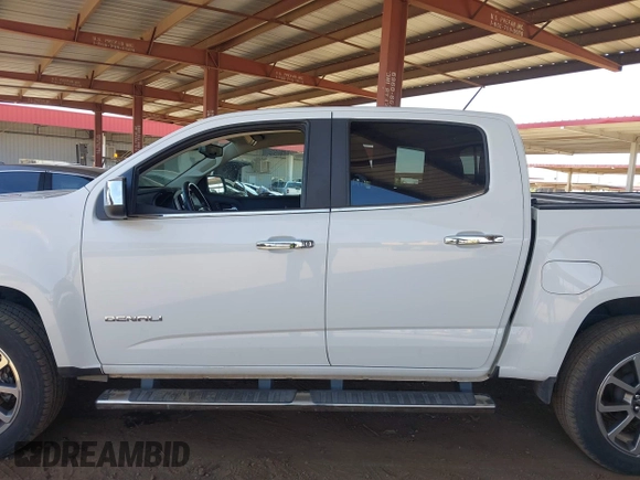 2018 GMC Canyon 4WD Denali z VIN 1GTP6EE11J1178961, wystawiony jako IAAI lot #42499884 z przebiegiem 71 309 mil mil oraz . Historia ofert i sprzedaży dostępna na DreamBid. Obrazek 14.