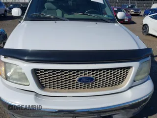 2003 Ford F-150 XLT with VIN 1FTRW08633KD11896, listed as a IAAI auction lot 42137360 with 118,654 mi miles. Bid and sale history available at carsss.com. Image 16.