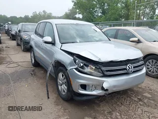 2013 Volkswagen Tiguan SE with VIN WVGBV3AX3DW572685, listed as a IAAI auction lot 42681638 with 122,269 mi miles and . Bid and sale history available at DreamBid. Image 1.