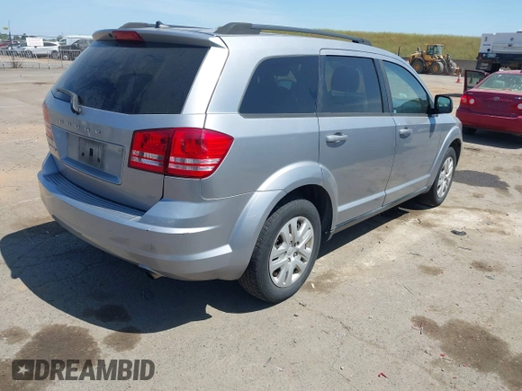2016 Dodge Journey SE with VIN 3C4PDCAB1GT230387, listed as a IAAI auction lot 42106842 with 157,299 mi miles. Bid and sale history available at carsss.com. Image 4.