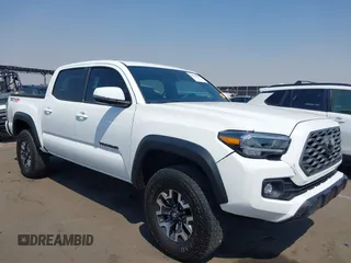 2023 Toyota Tacoma SR with VIN 3TMCZ5AN7PM630874, listed as a IAAI auction lot 40298041 with 8,635 mi miles and . Bid and sale history available at DreamBid. Image 1.