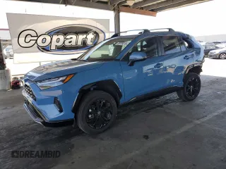 2022 Toyota RAV4 Hybrid SE with VIN 4T3T6RFV7NU103423, listed as a Copart auction lot 59709215 with 27,595 mi miles and Salvage title. Bid and sale history available at DreamBid. Image 1.
