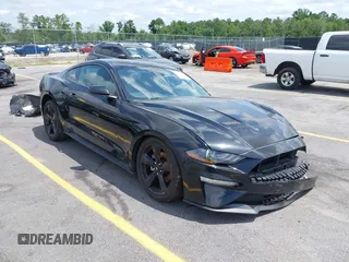 2022 Ford Mustang EcoBoost z VIN 1FA6P8TH1N5140385, wystawiony jako IAAI lot #42489617 z przebiegiem 68 927 mil mil oraz . Historia ofert i sprzedaży dostępna na DreamBid. Obrazek 1.