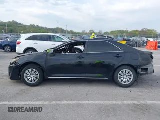 2012 Toyota Camry L z VIN 4T4BF1FK5CR206015, wystawiony jako IAAI lot #42057641 z przebiegiem Nie podano mil oraz . Historia ofert i sprzedaży dostępna na DreamBid. Obrazek 14.