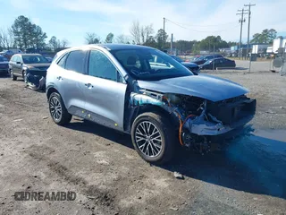 2022 Ford Escape SE Plug-In Hybrid z VIN 1FMCU0EZ9NUB79515, wystawiony jako IAAI lot #41065289 z przebiegiem 11 497 mil mil oraz . Historia ofert i sprzedaży dostępna na DreamBid. Obrazek 1.