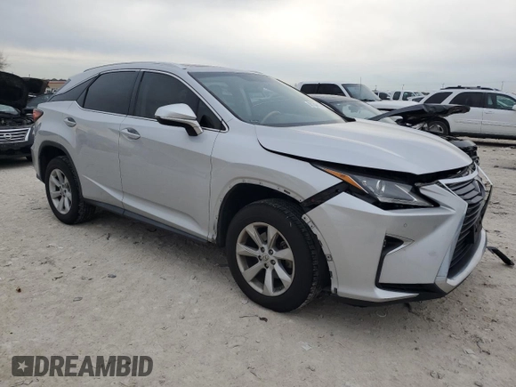 2016 Lexus RX 350 with VIN 2T2ZZMCA5GC034200, listed as a Copart auction lot 88129815 with 114,378 mi miles and Salvage title. Bid and sale history available at DreamBid. Image 4.