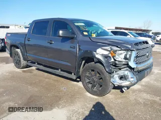 2020 Toyota Tundra SR5 with VIN 5TFEY5F12LX259046, listed as a IAAI auction lot 41760489 with 80,993 mi miles and . Bid and sale history available at DreamBid. Image 1.