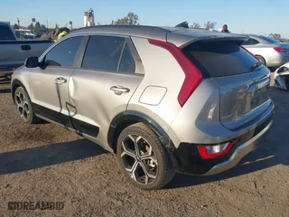 2023 Kia Niro EX Touring with VIN KNDCR3LE3P5093377, listed as a IAAI auction lot 41656245 with 96,469 mi miles. Bid and sale history available at carsss.com. Image 3.