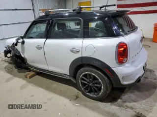 2016 MINI Countryman S with VIN WMWZC5C54GWT39755, listed as a Copart auction lot 50705915 with 133,466 mi miles and Salvage Title. Bid and sale history available at DreamBid. Image 2.