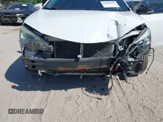 2019 Toyota Corolla L with VIN 5YFBURHE5KP880557, listed as a IAAI auction lot 41898199 with 83,003 mi miles and . Bid and sale history available at DreamBid. Image 6.