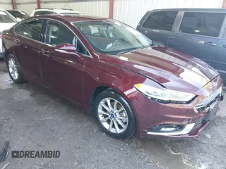 2017 Ford Fusion SE z VIN 3FA6P0HD2HR122650, wystawiony jako IAAI lot #41965411 z przebiegiem 107 227 mil mil oraz . Historia ofert i sprzedaży dostępna na DreamBid. Obrazek 1.