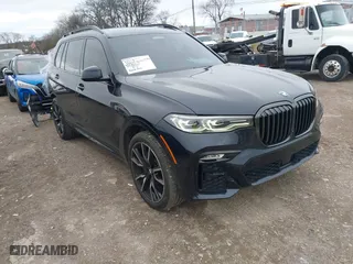 2022 BMW X7 xDrive40i with VIN 5UXCW2C08N9L13169, listed as a IAAI auction lot 41726947 with 59,752 mi miles. Bid and sale history available at carsss.com. Image 1.