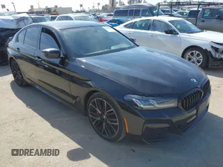2023 BMW 5 Series 530i z VIN WBA53BH08PWY21283, wystawiony jako IAAI lot #41603465 z przebiegiem 14 803 mil mil oraz . Historia ofert i sprzedaży dostępna na DreamBid. Obrazek 1.