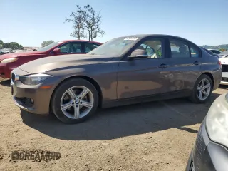 2014 BMW 3 Series 328i with VIN WBA3C1C54EK115517, listed as a Copart auction lot 52982655 with 63,203 mi miles and Salvage Title. Bid and sale history available at carsss.com. Image 1.