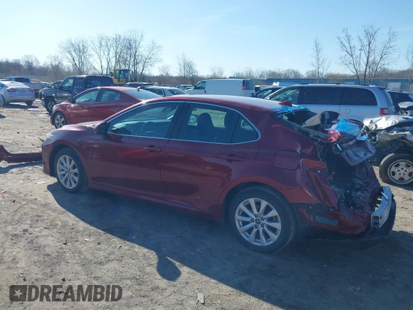 2019 Toyota Camry LE with VIN 4T1B11HK1KU233345, listed as a IAAI auction lot 41971136 with 51,499 mi miles and . Bid and sale history available at DreamBid. Image 3.