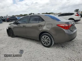 2019 Toyota Corolla L with VIN 2T1BURHE2KC180642, listed as a Copart auction lot 51488635 with 84,797 mi miles and Non Repairable. Bid and sale history available at DreamBid. Image 2.