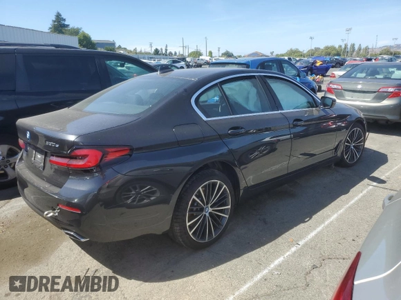 2023 BMW 5 Series 530e with VIN WBA13AG00PCL24045, listed as a Copart auction lot 84961634 with Not provided miles and Salvage title. Bid and sale history available at DreamBid. Image 3.