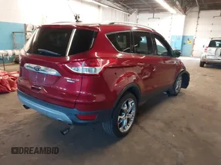 2014 Ford Escape Titanium with VIN 1FMCU9JX5EUC14849, listed as a IAAI auction lot 42037132 with 141,591 mi miles. Bid and sale history available at carsss.com. Image 4.