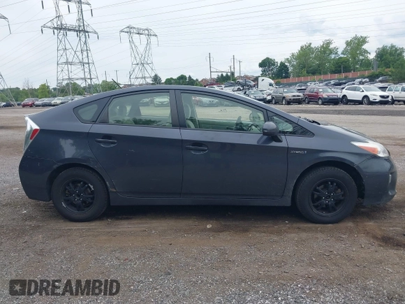 2012 Toyota Prius One z VIN JTDKN3DU4C1550194, wystawiony jako IAAI lot #42354483 z przebiegiem 185 690 mil mil oraz . Historia ofert i sprzedaży dostępna na DreamBid. Obrazek 14.