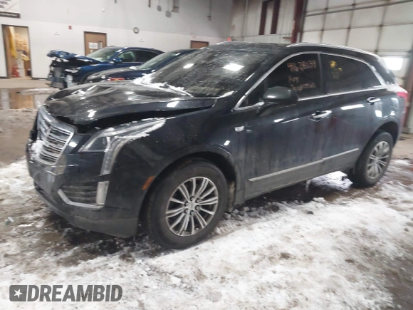 2018 Cadillac XT5 Luxury AWD with VIN 1GYKNDRSXJZ182299, listed as a IAAI auction lot 41628039 with 124,054 mi miles and . Bid and sale history available at DreamBid. Image 2.