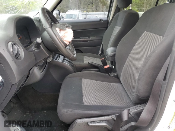 2017 Jeep Patriot Latitude with VIN 1C4NJPFB9HD187411, listed as a Copart auction lot 52579165 with 153,869 mi miles and Salvage Title. Bid and sale history available at DreamBid. Image 7.