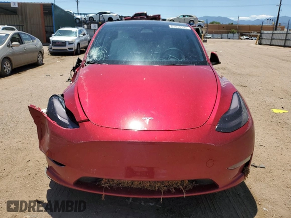 2024 Tesla Model Y Long Range z VIN 7SAYGDEE6RF156183, wystawiony jako Copart lot #61410155 z przebiegiem 27 112 mil mil oraz Szkoda całkowita • Salvage title. Historia ofert i sprzedaży dostępna na DreamBid. Obrazek 5.