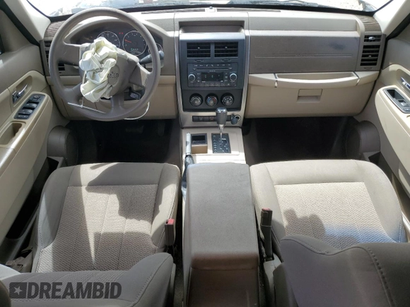 2010 Jeep Liberty Sport with VIN 1J4PP2GK4AW102018, listed as a Copart auction lot 50337815 with 117,385 mi miles and Salvage Title. Bid and sale history available at DreamBid. Image 8.