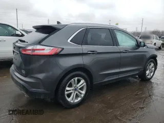 2020 Ford Edge SEL z VIN 2FMPK4J93LBB36067, wystawiony jako Copart lot #49913935 z przebiegiem 83 557 mil mil oraz Czysty tytuł • Clean title. Historia ofert i sprzedaży dostępna na DreamBid. Obrazek 3.
