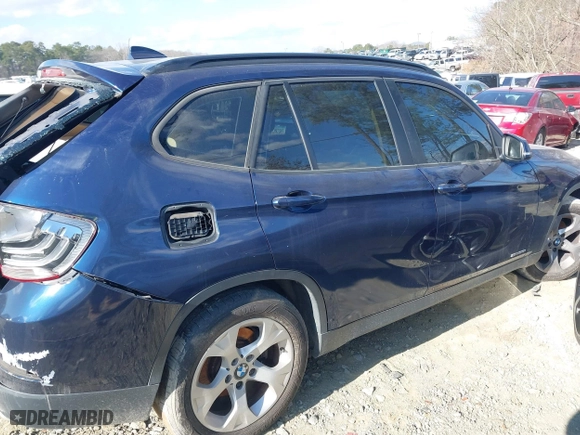 2013 BMW X1 28i with VIN WBAVM1C52DVW46153, listed as a IAAI auction lot 41236419 with 160,732 mi miles. Bid and sale history available at carsss.com. Image 13.