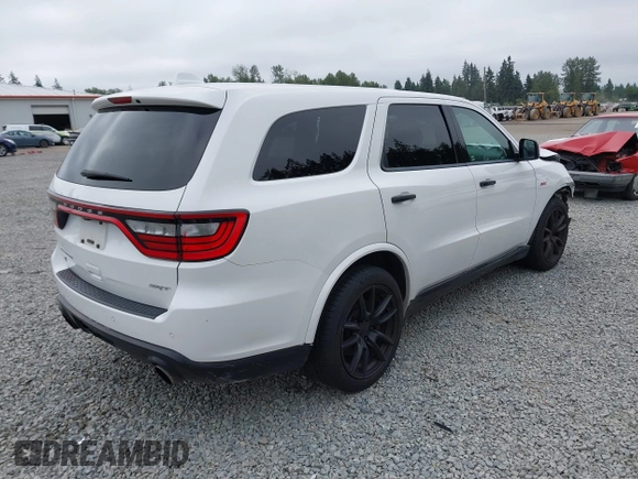 2019 Dodge Durango SRT with VIN 1C4SDJGJ0KC581440, listed as a IAAI auction lot 42473821 with 40,068 mi miles and . Bid and sale history available at DreamBid. Image 4.