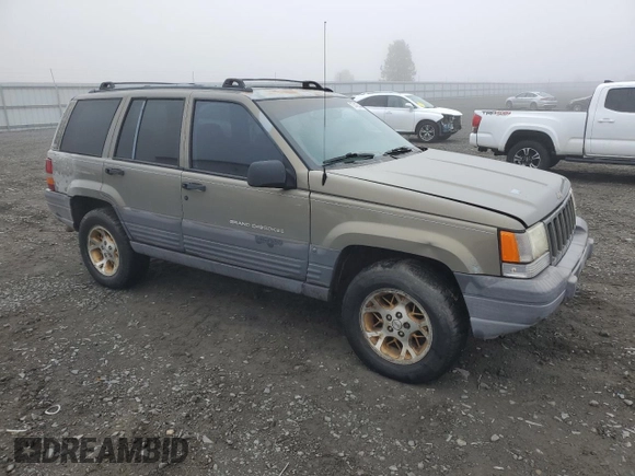 1997 Jeep Grand Cherokee Laredo with VIN 1J4GZ58Y5VC637350, listed as a Copart auction lot 77405444 with 182,482 mi miles and Clean Title. Bid and sale history available at carsss.com. Image 4.