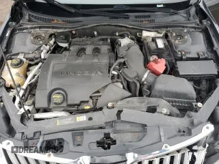2012 Lincoln MKZ z VIN 3LNHL2JC3CR816733, wystawiony jako Copart lot #51353215 z przebiegiem 149 256 mil mil oraz Szkoda całkowita • Salvage title. Historia ofert i sprzedaży dostępna na DreamBid. Obrazek 13.