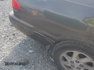 2000 Toyota Camry CE z VIN JT2BG28K3Y0513835, wystawiony jako IAAI lot #42309937 z przebiegiem 132 572 mil mil oraz . Historia ofert i sprzedaży dostępna na DreamBid. Obrazek 12.