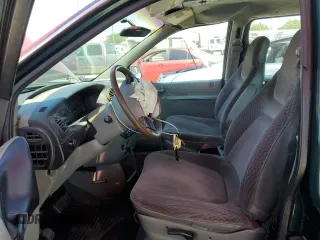 1999 Dodge Caravan with VIN 2B4FP25B0XR192013, listed as a Copart auction lot 55006624 with 195,008 mi miles and Salvage title. Bid and sale history available at DreamBid. Image 7.