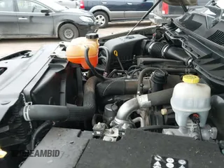 2014 Ram 1500 Big Horn z VIN 1C6RR7LM9ES475184, wystawiony jako IAAI lot #41140021 z przebiegiem 103 180 mil mil oraz . Historia ofert i sprzedaży dostępna na DreamBid. Obrazek 19.