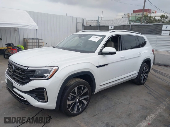 2024 Volkswagen Atlas SEL Premium R-Line with VIN 1V2FR2CA7RC543176, listed as a IAAI auction lot 42358945 with 7,066 mi miles and . Bid and sale history available at DreamBid. Image 18.