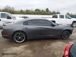 2014 Dodge Charger SE with VIN 2C3CDXBG8EH357664, listed as a IAAI auction lot 41860609 with 94,918 mi miles. Bid and sale history available at carsss.com. Image 13.