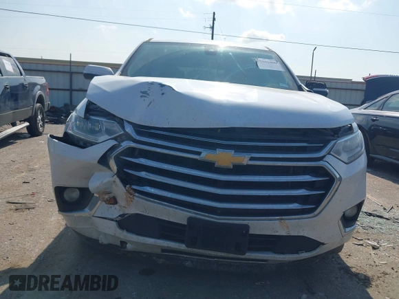 2020 Chevrolet Traverse High Country with VIN 1GNEVNKWXLJ135322, listed as a IAAI auction lot 42042466 with 105,748 mi miles and . Bid and sale history available at DreamBid. Image 6.