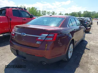 2016 Ford Taurus SEL z VIN 1FAHP2H8XGG136549, wystawiony jako IAAI lot #42338455 z przebiegiem 170 123 mil mil oraz . Historia ofert i sprzedaży dostępna na DreamBid. Obrazek 4.