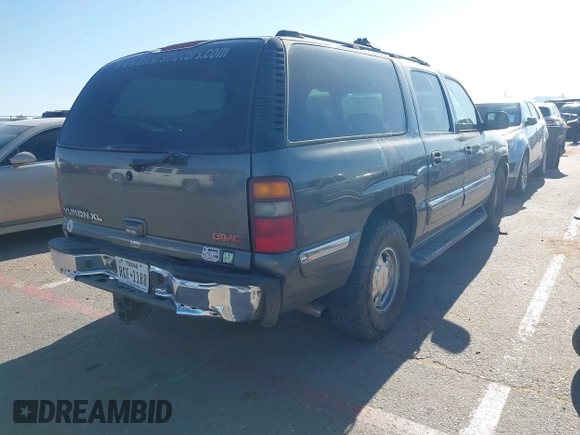 2002 GMC Yukon XL SLT z VIN 1GKFK16Z12J180669, wystawiony jako IAAI lot #42317437 z przebiegiem 168 827 mil mil oraz . Historia ofert i sprzedaży dostępna na DreamBid. Obrazek 4.