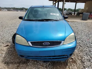 2007 Ford Focus S with VIN 1FAFP34N67W101523, listed as a Copart auction lot 56521835 with 239,505 mi miles and Salvage title. Bid and sale history available at DreamBid. Image 5.