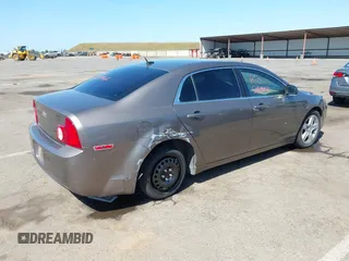 2011 Chevrolet Malibu 1LS with VIN 1G1ZB5E1XBF215846, listed as a IAAI auction lot 42153073 with Not Provided miles and . Bid and sale history available at DreamBid. Image 4.