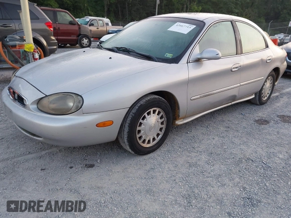 1999 Mercury Sable GS с VIN 1MEFM50U6XA655488, выставлен на аукционе IAAI как лот 42667715 с пробегом 200 917 миль миль и . История ставок и продаж доступна на DreamBid. Изображение 2.