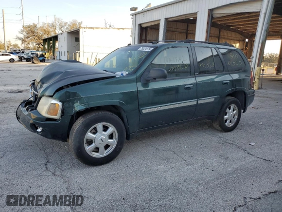 2005 GMC Envoy SLT with VIN 1GKDS13S652329610, listed as a Copart auction lot 76384914 with Not Provided miles and Salvage Title. Bid and sale history available at DreamBid. Image 1.