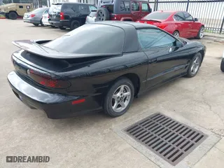 2000 Pontiac Firebird Formula with VIN 2G2FV22G1Y2104657, listed as a IAAI auction lot 41510589 with 1 mi miles. Bid and sale history available at carsss.com. Image 4.